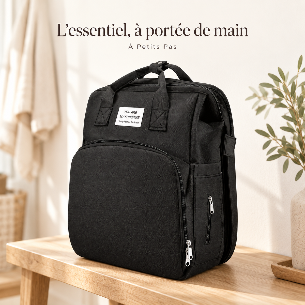L’essentiel, à portée de main — Sac à dos à langer — tapis nomade intégré